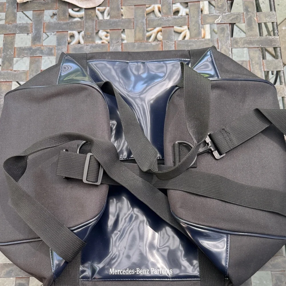 Mercedes-Benz Parfums Black canvas double handles duffel bag